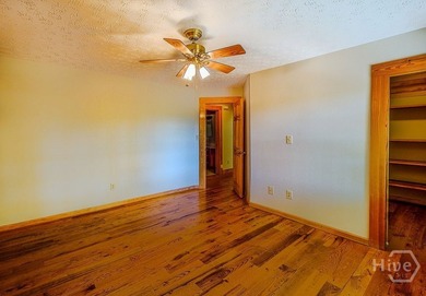 Tucked away on 4.12 private acres with approximately 350 feet of - photo 19