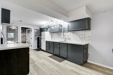 Light-filled and spacious, this open floor plan features vaulted - photo 25