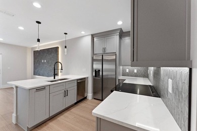 Life at 455 Riverview Avenue begins beneath the quiet canopy of - photo 13