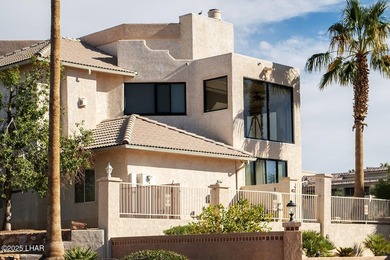 Nestled on the 4th fairway in RESIDENTIAL ESTATES, this stunning - photo 4
