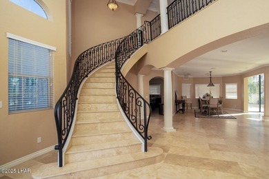 Nestled on the 4th fairway in RESIDENTIAL ESTATES, this stunning - photo 7