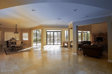 Nestled on the 4th fairway in RESIDENTIAL ESTATES, this stunning - photo 8