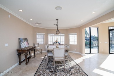 Nestled on the 4th fairway in RESIDENTIAL ESTATES, this stunning - photo 9