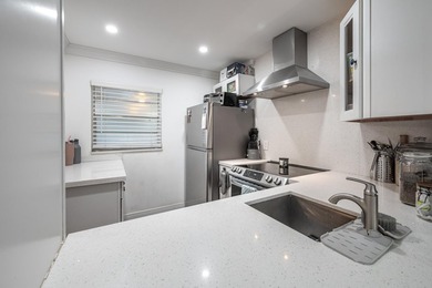 Updated first-floor condo with stunning lake views & abundant - photo 2