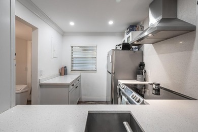 Updated first-floor condo with stunning lake views & abundant - photo 3