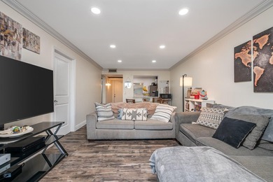 Updated first-floor condo with stunning lake views & abundant - photo 4