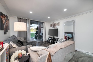 Updated first-floor condo with stunning lake views & abundant - photo 6