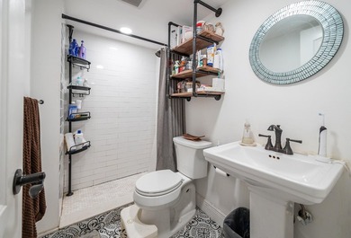 Updated first-floor condo with stunning lake views & abundant - photo 8