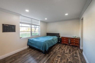 Updated first-floor condo with stunning lake views & abundant - photo 9