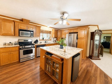 Experience stunning lakefront living in this spacious 4-bedroom - photo 4