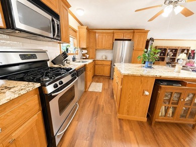 Experience stunning lakefront living in this spacious 4-bedroom - photo 5