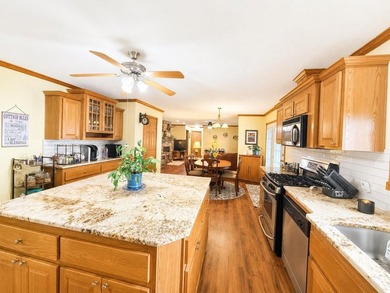 Experience stunning lakefront living in this spacious 4-bedroom - photo 6