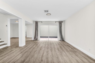 Beautifully updated two-story townhouse located in the highly - photo 8
