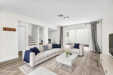 Beautifully updated two-story townhouse located in the highly - photo 9