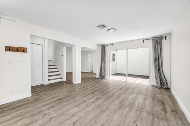 Beautifully updated two-story townhouse located in the highly - photo 10