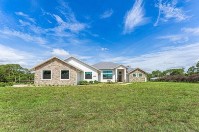 Welcome to 16631 132nd Terrace North, a newly completed custom - photo 2