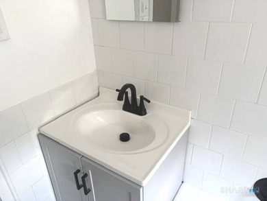 This large one bedroom unit is conveniently located in the - photo 12