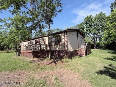 Horton Summit Home is located on 0.45 acres with chain-link - photo 3