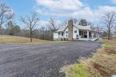 Charming farmhouse set on 5 picturesque acres in the highly