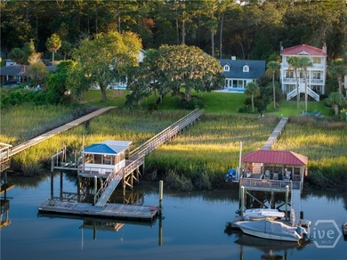 Perched on deep water along Richardson Creek, this reimagined - photo 2