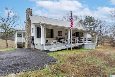 Charming farmhouse set on 5 picturesque acres in the highly