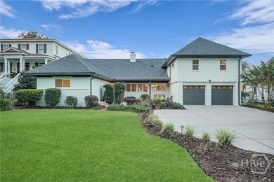 Perched on deep water along Richardson Creek, this reimagined - photo 4