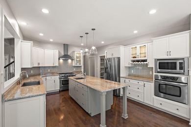 Highly desirable Sand Creek property!!!! Presenting this custom - photo 8