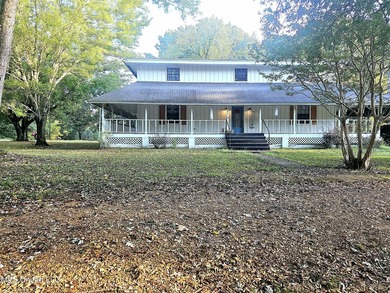 2 acre corner lot with wraparound porch. **USDA Eligible** 4 - photo 1