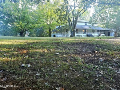 2 acre corner lot with wraparound porch. **USDA Eligible** 4 - photo 2