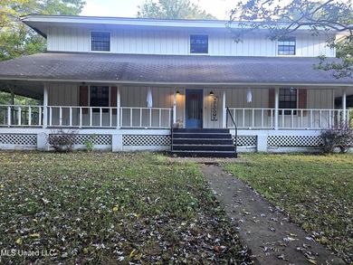 2 acre corner lot with wraparound porch. **USDA Eligible** 4 - photo 3