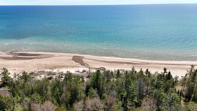 Beautiful opportunity here, 100 Ft of Lake huron frontage, .62 - photo 1