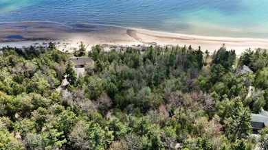 Beautiful opportunity here, 100 Ft of Lake huron frontage, .62 - photo 10
