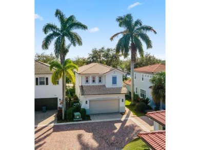 Lake Home For Sale in Palm Beach Gardens, Florida