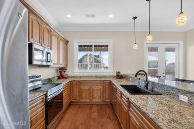 Welcome to 117 Janelle Drive, an exceptional waterfront home on