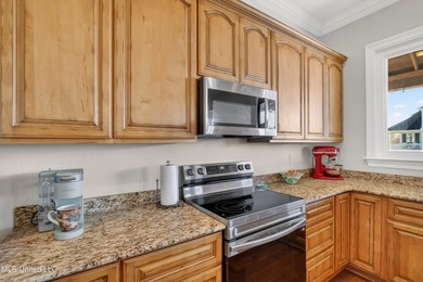 Welcome to 117 Janelle Drive, an exceptional waterfront home on