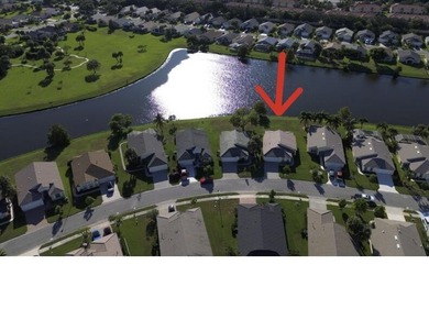 Beautifully maintained 3BR/2BA lake-view home in the gated - photo 1