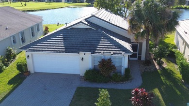 Beautifully maintained 3BR/2BA lake-view home in the gated - photo 2