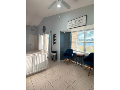 Beautifully maintained 3BR/2BA lake-view home in the gated - photo 7