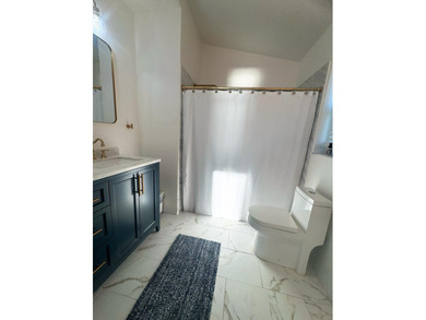 Beautifully maintained 3BR/2BA lake-view home in the gated - photo 8