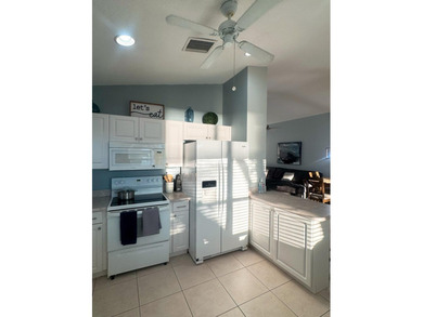 Beautifully maintained 3BR/2BA lake-view home in the gated - photo 9