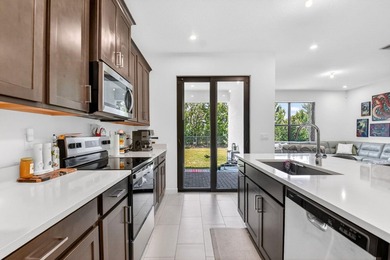 Welcome to 7351 Lenora Lane, a beautifully upgraded home built - photo 6