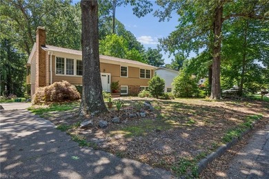 Spacious and versatile, this 6-bedroom, 4-bath split-level home - photo 3