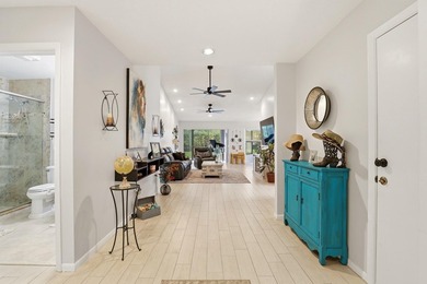 Welcome to this charming 2 bed 2 bath home in the highly - photo 4