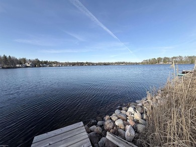 Over 100 feet of sandy lake frontage on highly sought-after Long - photo 17