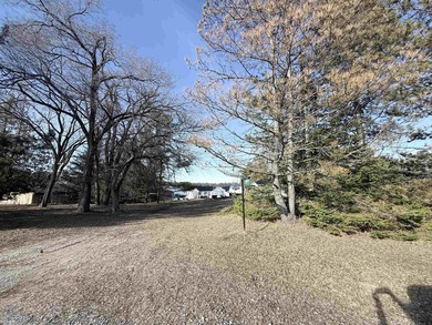 Over 100 feet of sandy lake frontage on highly sought-after Long - photo 24
