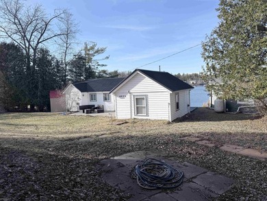 Over 100 feet of sandy lake frontage on highly sought-after Long - photo 42