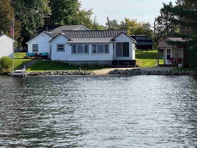 Over 100 feet of sandy lake frontage on highly sought-after Long - photo 48