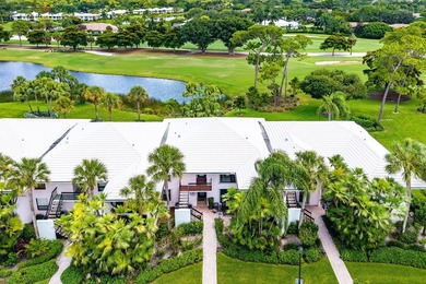 Enjoy sweeping golf course and lake views from this beautifully - photo 1