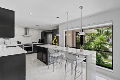 Enjoy sweeping golf course and lake views from this beautifully - photo 2