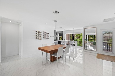 Enjoy sweeping golf course and lake views from this beautifully - photo 4